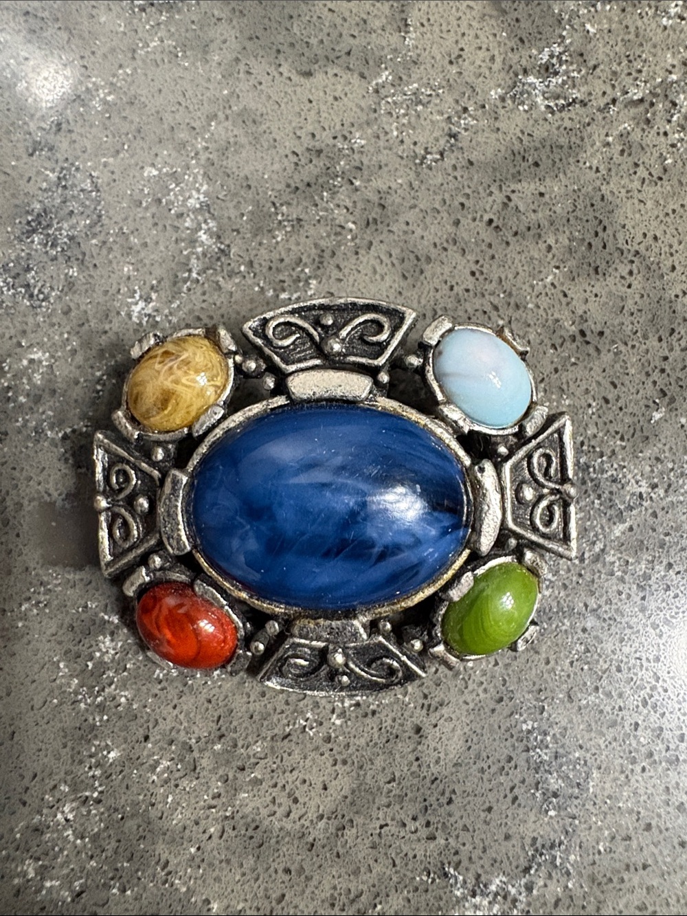 Multistone Silver-Tone Brooch with Blue Center and Accent Stones. Also Pendant.
